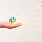 Holographic robot AI teammate joining a Slack-style team thread to delegate and complete tasks in the cloud.